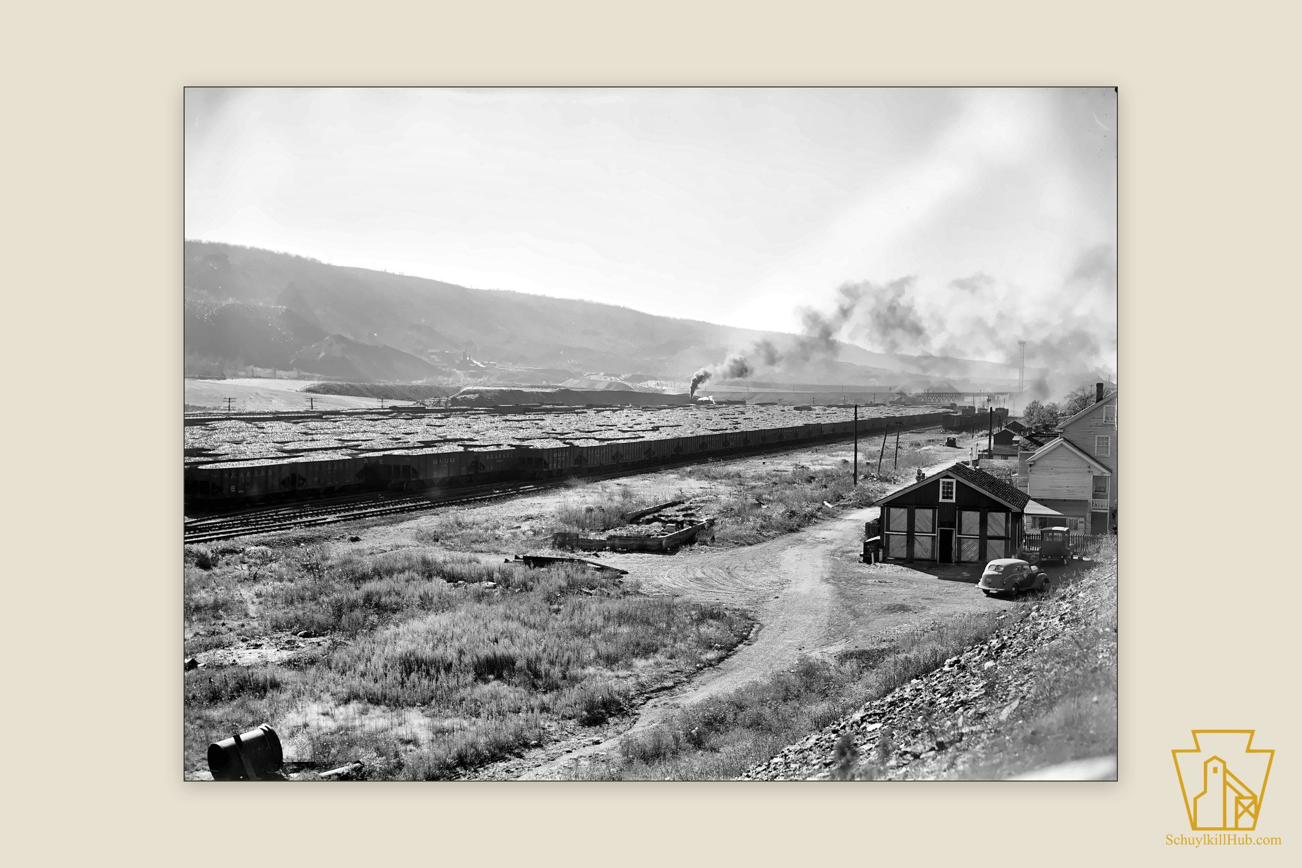 A rail yard filled with loaded coal hopper cars near the St. Nicholas breaker.