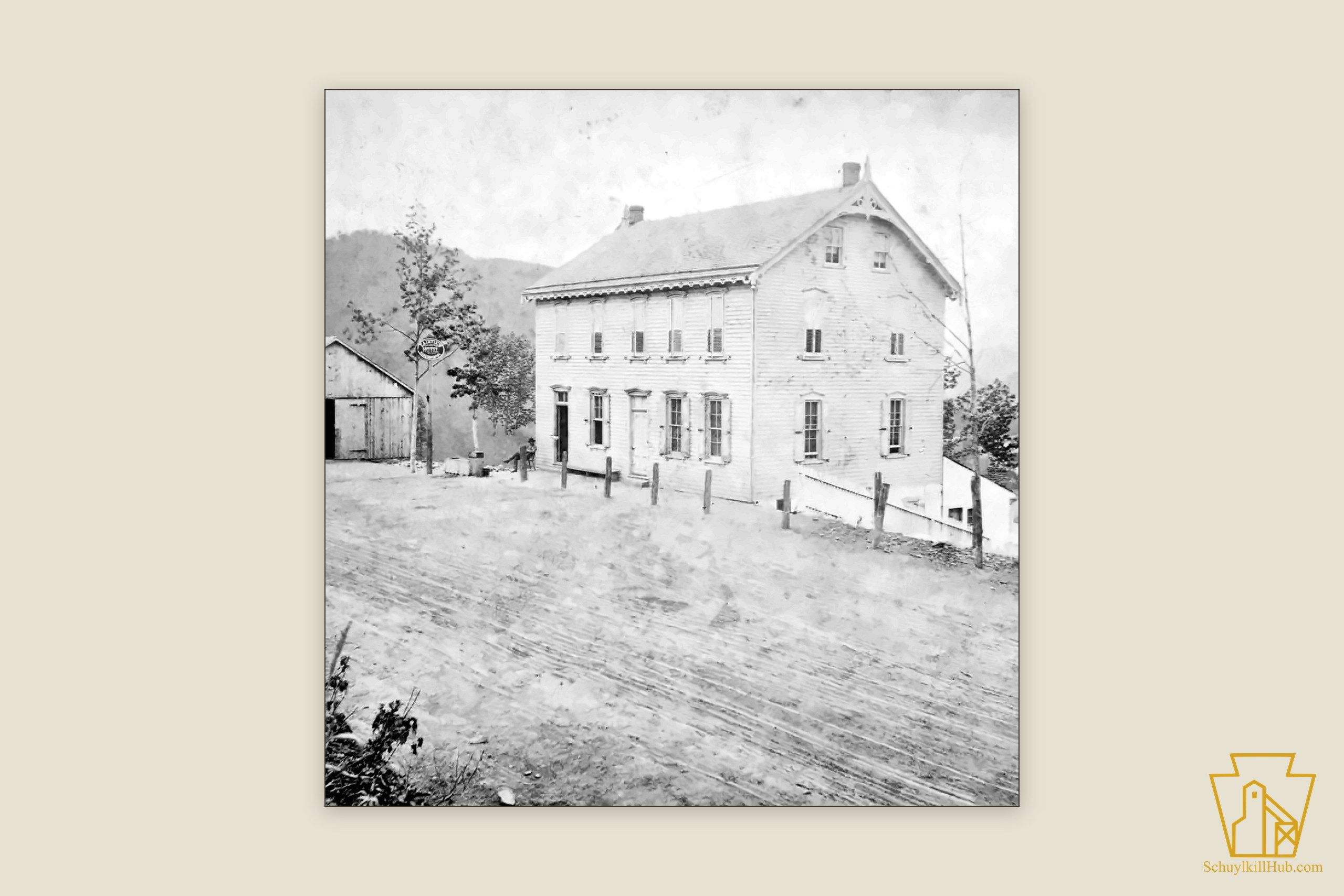 The clapboard Fair View Hotel with hanging sign, barn and dirt road in wooded hills — a stereograph frame.