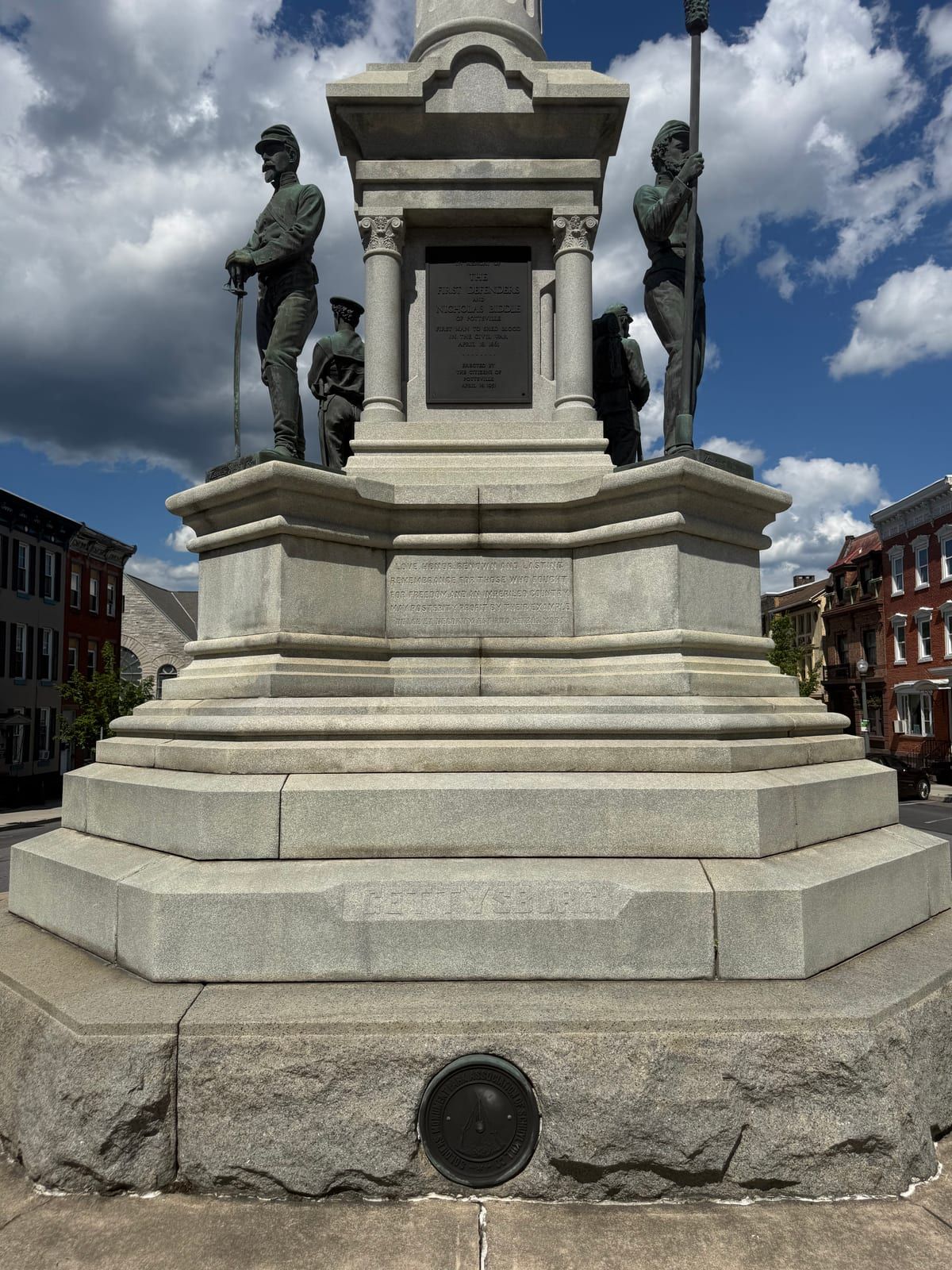 The Soldiers' & Sailors' Monument in Garfield Square, Pottsville — a granite column with bronze Civil War figures at its base.