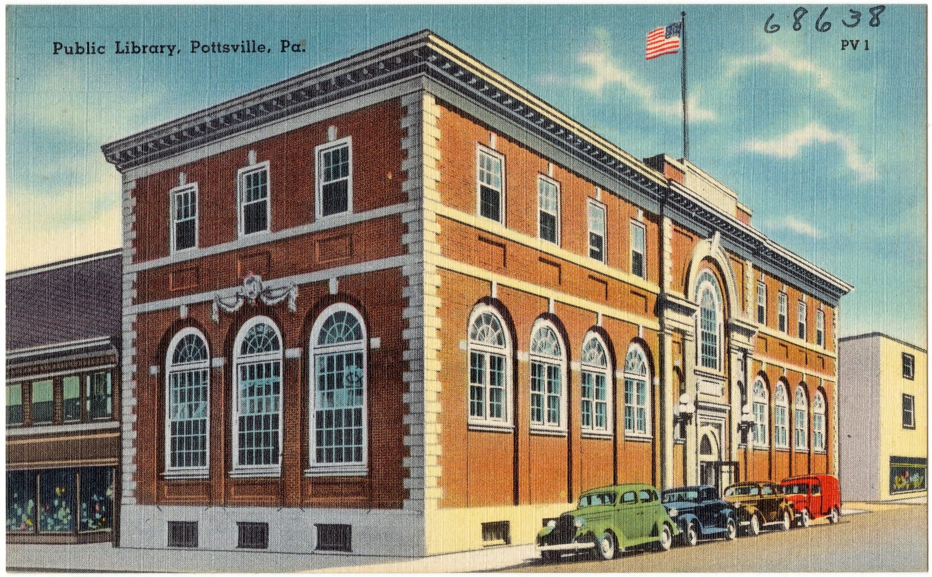 A color linen postcard captioned "Public Library, Pottsville, Pa." showing the two-story red-brick Pottsville Free Public Library on the corner of Third and West Market Streets: light stone quoins at the corner, tall round-arched windows across the ground floor with a carved swag above, rectangular second-floor windows under a dentiled cornice, and an American flag at the roofline, with 1930s automobiles parked along the curb.