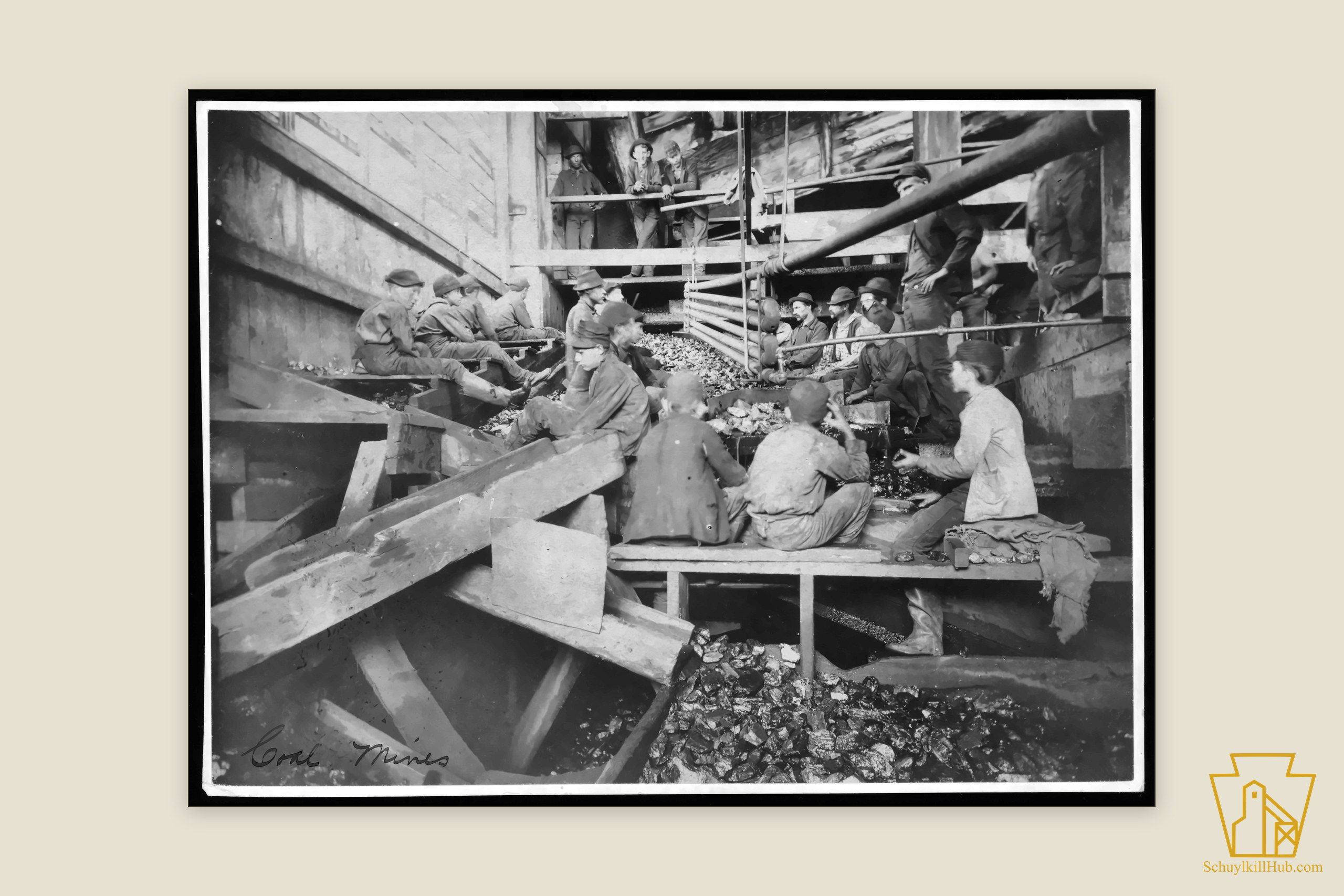 Blue-toned cyanotype of breaker boys picking slate along the chutes inside the Kohinoor breaker.