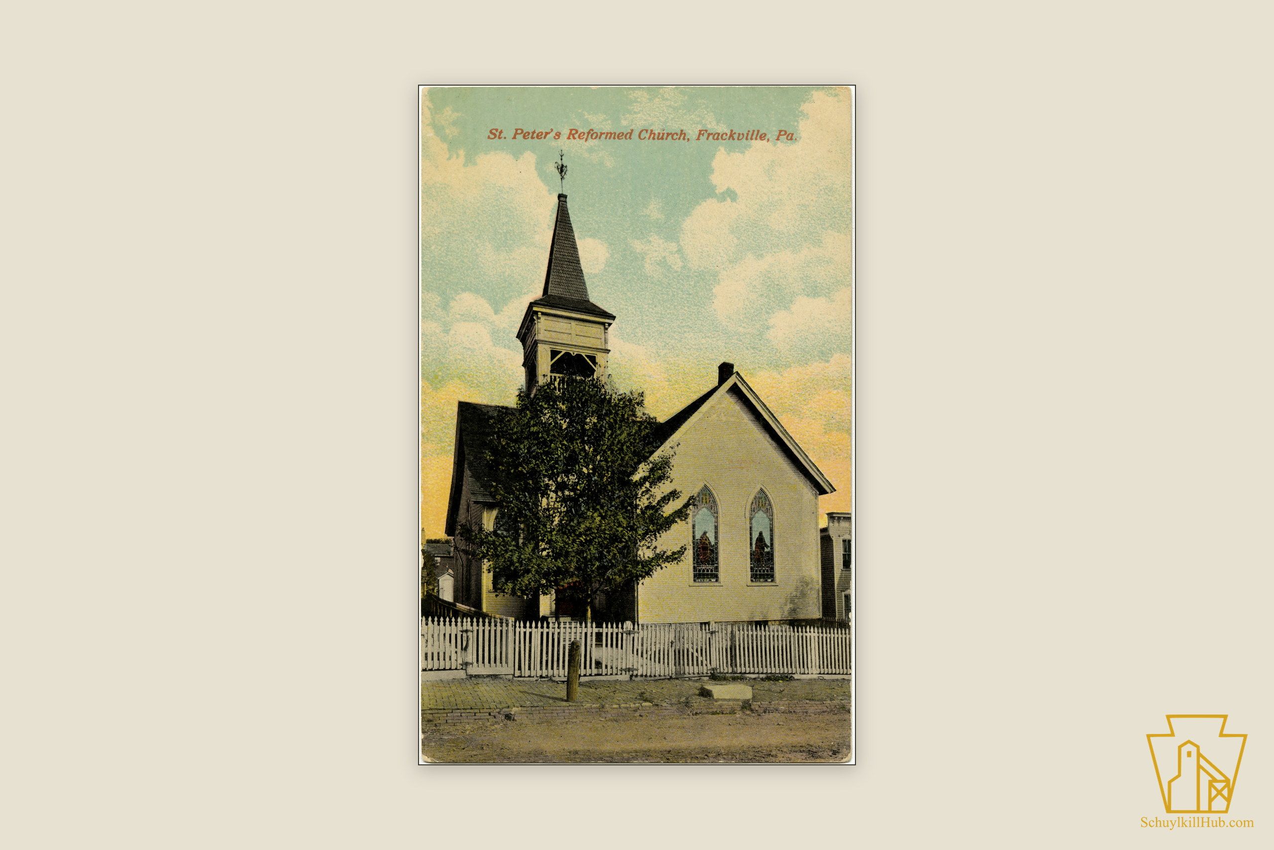 Colorized photographic postcard of the clapboard St. Peter’s Reformed Church at Frackville, shingled steeple over a picket fence.