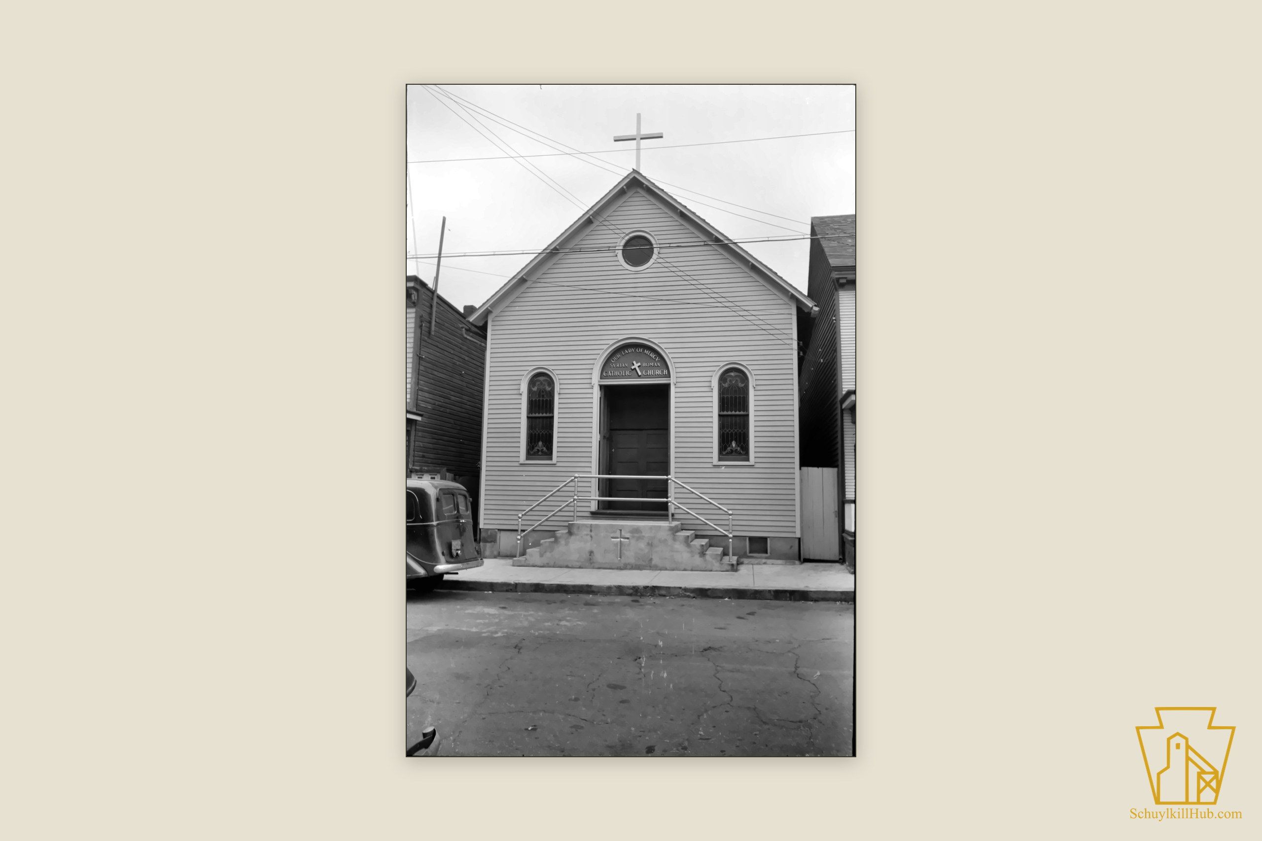 The small clapboard church of Our Lady of Mercy on a Shenandoah street.
